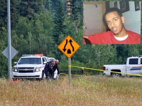 Police examine the scene west of Calgary near Highway 8 where Hanock Afowerk's body was discovered on July 12, 2017.