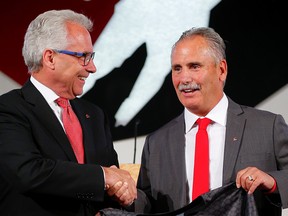 Hockey Canada CEO Tom Renney with Willie Desjardins, who will coach Canada's national men's hockey team.