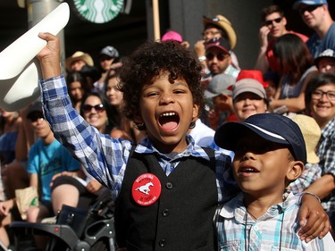 Thousand of people came out to take in the 2017 Calgary Stampede Parade.These kids were having a great time.Friday July 7, 2017 in Calgary, AB. DEAN PILLING/POSTMEDIA