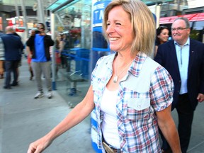 Alberta Premier Rachel Notley and Brian Mason, Minister of Transportation and Minister of Infrastructure, arrive at the announcement of Provincial funding for the Calgary Green Line in downtown Calgary on Thursday July 6, 2017. The Province of Alberta will provide one-third of the total project cost, up to $1.53 billion over eight years to support stage 1 and the project is the largest infrastructure project in the history of the City of Calgary.  Jim Wells//Postmedia