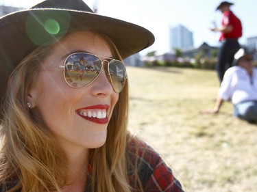 Jacquee Ball takes in the sunshine at Fort Calgary during the Oxford Stomp. This year's event features music from Serena Ryder, Our Lady Peace and Corey Hart.Friday July 14, 2017 in Calgary, AB. DEAN PILLING/POSTMEDIA