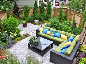 Backyard bliss: This urban oasis invites quiet, relaxing days minus the mower. (Courtesy of losethelawn.ca)