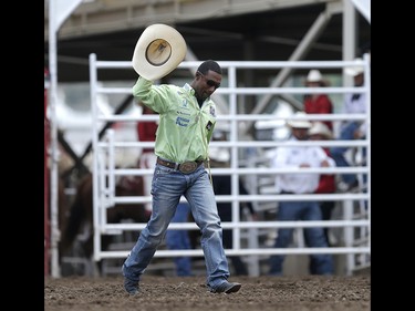 Cory Solomon of Prairie View, Texas celebrates his win in tie-down roping at the Calgary Stampede on Sunday July 16, 2017. Leah Hennel/Postmedia