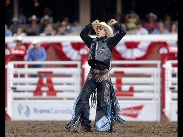 Zeke Thurston of Big Valley, Alberta wins the saddle bronc championship at the calgary Stampede on Sunday July 16, 2017. Leah Hennel/Postmedia