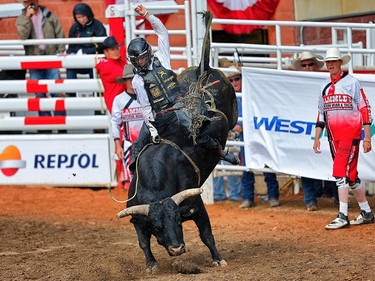 Oklahoma cowboy Sage Steele Kimzey rode Night Moves to a score of 91 and a $100,000 win in the bull-riding competition on Championship Sunday at the 2017 Calgary Stampede. AL CHAREST/POSTMEDIA