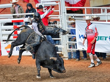 Oklahoma cowboy Sage Steele Kimzey rode Night Moves to a score of 91 and a $100,000 win in the bull-riding competition on Championship Sunday at the 2017 Calgary Stampede. AL CHAREST/POSTMEDIA