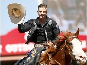 Zeke Thurston from Big Valley, AB, riding Super Sox wins the Saddle Bronc event on day 7 of the 2017 Calgary Stampede rodeo on Thursday July 13, 2017.