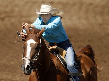 Tiany Schuster sets an arena record in barrel racing at the Calgary Stampede,  Friday July 14, 2017. Leah Hennel/Postmedia