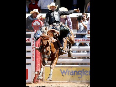 Zeke Thurston from Big Valley, AB, riding Super Sox wins the Saddle Bronc event on day 7 of the 2017 Calgary Stampede rodeo on Thursday July 13, 2017. DARREN MAKOWICHUK/Postmedia Network