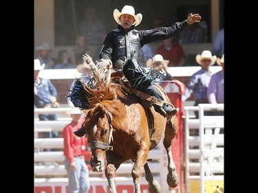 Zeke Thurston from Big Valley, AB, riding Super Sox wins the Saddle Bronc event on day 7 of the 2017 Calgary Stampede rodeo on Thursday July 13, 2017. DARREN MAKOWICHUK/Postmedia Network