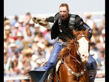 Tanner Byrne from Prince Albert, SK,  riding Rock This Way wins the bull riding event on day 6 of the 2017 Calgary Stampede rodeo on  Wednesday July 12, 2017. DARREN MAKOWICHUK/Postmedia Network