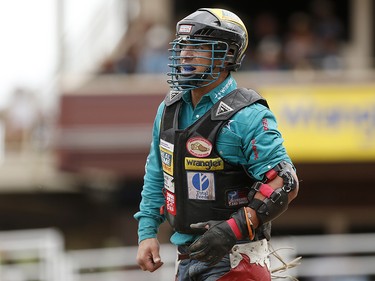 Mike Lee of Fort Worth, Texas runs a victory lap  during bull riding at the Calgary Stampede, Saturday July 15, 2017. Leah Hennel/Postmedia