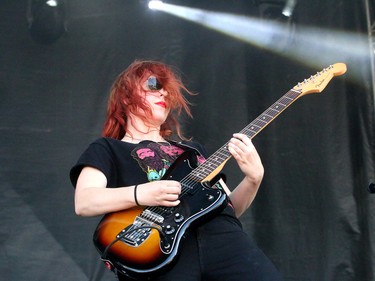 Guitarist Joan Smith of the Serena Ryder band performs at Fort Calgary during the Oxford Stomp. Friday July 14, 2017 in Calgary, AB. DEAN PILLING/POSTMEDIA