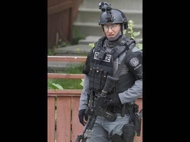 Police respond to an incident related to a stabbing in Calgary on Tuesday July 4, 2017. A stand off with a suspect lasted hours as negotiators dealt with a suspect.Jim Wells//Postmedia