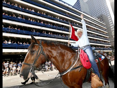 Thousands came out to watch the 105th Calgary Stampede Parade in downtown Calgary to kickoff The Greatest Outdoor Show on Earth on Friday July 7, 2017. DARREN MAKOWICHUK/Postmedia Network