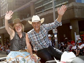 Premier Rachel Notley and Joe Ceci wave as thousands came out to watch the 105th Calgary Stampede Parade in downtown Calgary to kickoff The Greatest Outdoor Show on Earth on Friday July 7, 2017. DARREN MAKOWICHUK/Postmedia Network

Postmedia Calgary Stampede2017
Darren Makowichuk, DARREN MAKOWICHUK/Postmedia