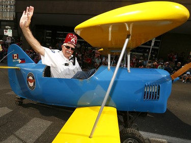 The Calgary Firefighters Associations as thousands came out to watch the 105th Calgary Stampede Parade in downtown Calgary to kickoff The Greatest Outdoor Show on Earth on Friday July 7, 2017. DARREN MAKOWICHUK/Postmedia Network