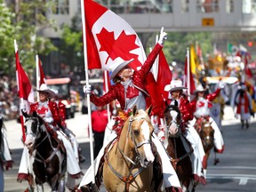 The Calgary Syampede Showriders as thousands came out to watch the 105th Calgary Stampede Parade in downtown Calgary to kickoff The Greatest Outdoor Show on Earth on Friday July 7, 2017. DARREN MAKOWICHUK/Postmedia Network