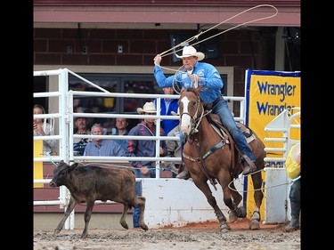 Matt Shiozawa from Chubbuck Idaho scored a 7.3 to win the tie-down roping event at the Calgary Stampede rodeo, Tuesday  July 11, 2017. GAVIN YOUNG/POSTMEDIA