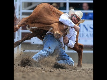 Jason Thomas from Tremonton, Utah won the  steer wrestling event with at time of 3.5 seconds on day 4 of the 2017 Calgary Stampede rodeo on Monday July 10, 2017.  GAVIN YOUNG/POSTMEDIA