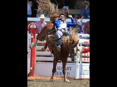 Caleb Bennett from Tremonton, Utah won the  bareback event riding Zastron Acres to a score of 87.5 on day 4 of the 2017 Calgary Stampede rodeo on Monday July 10, 2017.  GAVIN YOUNG/POSTMEDIA