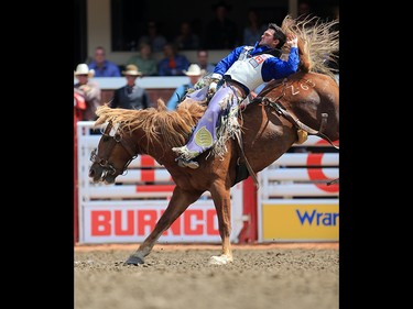 Caleb Bennett from Tremonton, Utah won the  bareback event riding Zastron Acres to a score of 87.5 on day 4 of the 2017 Calgary Stampede rodeo on Monday July 10, 2017.