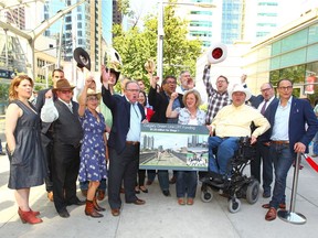 Policticians, and dignitaries celebrate following the announcement of Provincial funding for the Calgary Green Line in downtown Calgary on Thursday July 6, 2017. The Province of Alberta will provide one-third of the total project cost, up to $1.53 billion over eight years to support stage 1 and the project is the largest infrastructure project in the history of the City of Calgary. Jim Wells//Postmedia
Jim Wells, Jim Wells/Postmedia
