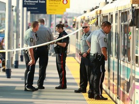 Calgary Police and Calgary Transit officers hold the scene of a stabbing at the Rundle Station in northeast Calgary on Tuesday July 18, 2017. One car seemed to be taped off by officers as they gathered evidence. Jim WellsPostmedia
Jim Wells, Jim Wells/Postmedia