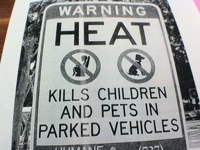 After a rash of dogs locked in hot cars, Councillor Gloria Lindsay Luby is asking city council to request store owners display signs like this one in their plaza parking lots. DON PEAT/TORONTO SUN/QMI AGENCY
Don Peat/Toronto Sun/QMI Agency, Don Peat/Toronto Sun/QMI Agency