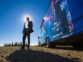 Former Wildrose leader Brian Jean stands near his campaign RV after launching his bid for leadership of the new United Conservative Party at an event near Airdrie on Monday July 24, 2017.