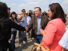 UCP leadership candidate Jason Kenny shakes hands following a media event at the Blackfoot Diner in Calgary on Tuesday Aug 1, 2017.