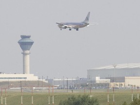 TRANSPORTATION SAFETY Board inspectors scour the Air France Airbus for clues about why it skidded off the runway. The jet is broken into three pieces in a ravine adjacent to Pearson Airport.n/a