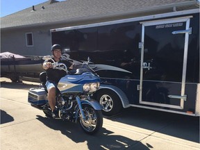 Facebook photo of Jason Dirk and the motorcycle and trailer that were stolen from his backyard. ORG XMIT: I6rYzbSieuD-OVZufEzy

Postmedia Calgary For story by Valerie Fortney Facebook screen grab
Facebook