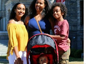 Meseret Shiferaw (centre) with her three young children who were were killed in a crash near Hanna on Wednesday, Aug. 16, 2017. Calgary's Ethiopian community is helping raise funds to transport the girls' body home to the United States. Supplied photo