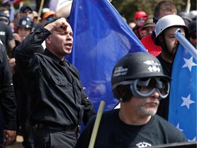 Violent Clashes Erupt at "Unite The Right" Rally In Charlottesville

CHARLOTTESVILLE, VA - AUGUST 12:  White nationalists, neo-Nazis and members of the "alt-right" exchange insluts with counter-protesters as they attempt to guard the entrance to Lee Park during the "Unite the Right" rally August 12, 2017 in Charlottesville, Virginia. After clashes with anti-fascist protesters and police the rally was declared an unlawful gathering and people were forced out of Lee Park, where a statue of Confederate General Robert E. Lee is slated to be removed.  (Photo by Chip Somodevilla/Getty Images)
Chip Somodevilla, Getty Images