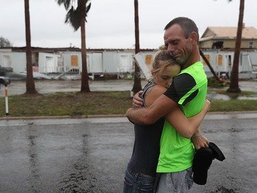 ROCKPORT, TX - AUGUST 26: Jessica Campbell hugs Jonathan Fitzgerald (L-R) after riding out Hurricane Harvey in an apartment on August 26, 2017 in Rockport, Texas.  Jessica said is became very scary once Hurricane Harvey hit their town. Harvey made landfall shortly after 11 p.m. Friday, just north of Port Aransas as a Category 4 storm and is being reported as the strongest hurricane to hit the United States since Wilma in 2005. Forecasts call for as much as 30 inches of rain to fall by next Wednesday.