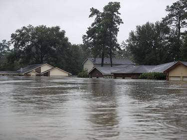 HOUSTON, TX - AUGUST 28:  Homes are seen inundated with flooding from Hurricane Harvey on August 28, 2017 in Houston, Texas. Harvey, which made landfall north of Corpus Christi late Friday evening, is expected to dump upwards to 40 inches of rain in Texas over the next couple of days.  (Photo by Joe Raedle/Getty Images)