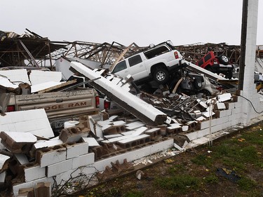 A destroyed buildingand vehicles at Rockport Airport after heavy damage when Hurricane Harvey hit Rockport, Texas on August 26, 2017.  Hurricane Harvey left a trail of devastation Saturday after the most powerful storm to hit the US mainland in over a decade slammed into Texas, destroying homes, severing power supplies and forcing tens of thousands of residents to flee. / AFP PHOTO / MARK RALSTONMARK RALSTON/AFP/Getty Images