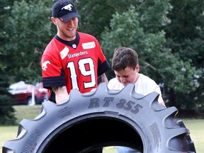 Calgary Stampeders Quarterback Bo Levi Mitchell hosted the first All-Stars For Kids Day event to kick off Big Brothers Big Sisters Fundraising Campaign with up to 100 children and youth from Big Brothers Big Sisters programs being coached and cheered on by Bo and a team of his athlete friends as they ran through a ninja warrior obstacle course at WinSport in Calgary on Monday August 7, 2017. Darren Makowichuk/Postmedia