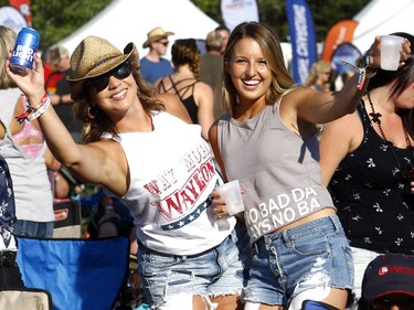 Fans dance as Chase Bryant performs on day one of the Country Thunder music festival held at Prairie Winds Park Friday, August 18, 2017. Dean Pilling/Postmedia