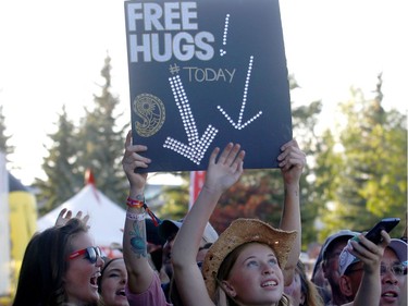 Fans cheer as Dallas Smith performs on day one of the Country Thunder music festival held at Prairie Winds Park Friday, August 18, 2017. Dean Pilling/Postmedia