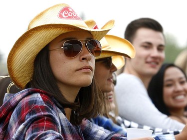 Emma Derbyshire watches The James Barker Band perform on day three of the Country Thunder music festival held at Prairie Winds Park on Sunday, August 20, 2017. Dean Pilling/Postmedia