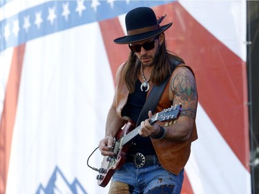 Clayton Bellamy of the Road Hammers perform on day two of the Country Thunder music festival held at Prairie Winds Park Saturday, August 19, 2017.