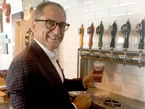 Alberta Finance Minister Joe Ceci pours a beer on August 4, 2017 at Common Crown Brewing Co. in Calgary. A newly created taproom licence will permit manufacturers to offer food service along with events and entertainment. These are often referred to as taprooms. Alberta Gaming and Liquor Commission policies have been revamped to add the new licence category so it is easier for liquor manufacturers to host events and engage more fully in their local communities. The Gaming and Liquor Regulation has also been amended so small manufacturers can operate licensed restaurants or bars away from where they produce. Chris Varcoe/Postmedia

Postmedia Calgary via Parks Canada
Chris Varcoe/Postmedia