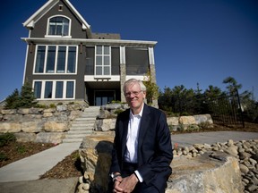 Calgary Health Trust CEO Dr. Chris Eagle outside the 5,000 square foot showhome for the Hospital Home Lottery in the community of Mahogany in Calgary on Wednesday August 23, 2017. Leah Hennel/Postmedia