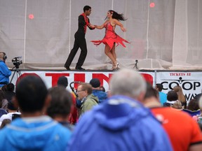 Dancers from Rumba Cuban Dance School perform at Expo Latino at Prince's Island Park in Calgary, Alta., on Saturday August 23, 2014. Mike Drew/Calgary Sun/QMI Agency