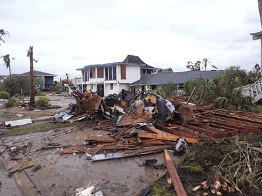 Debris lies on the ground near homes in the Key Allegro subdivision of Rockport, Texas in the wake of Hurricane Harvey on Monday, Aug. 28, 2017. (Rachel Denny Clow/Corpus Christi Caller-Times via AP) ORG XMIT: TXCOR224