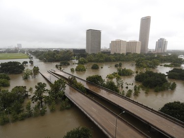 An overhead view of the flooding in Houston, from Buffalo Bayou on Memorial Drive and Allen Parkway, as heavy rains continue falling from Tropical Storm Harvey, Monday, Aug. 28, 2017. ( Karen Warren/Houston Chronicle via AP) ORG XMIT: TXHOU102