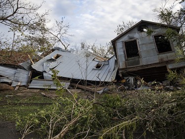 A building sits toppled from Hurricane Harvey in Refugio, Texas, Monday, Aug. 28, 2017. (Nick Wagner/Austin American-Statesman via AP) ORG XMIT: TXAUS50