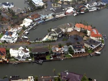 This aerial photo shows a view of damage in the wake of Hurricane Harvey, Monday, Aug. 28, 2017, in Corpus Christi, Texas. Harvey hit the coast as a Category 4 hurricane. (Gabe Hernandez/Corpus Christi Caller-Times via AP) ORG XMIT: TXCOR205